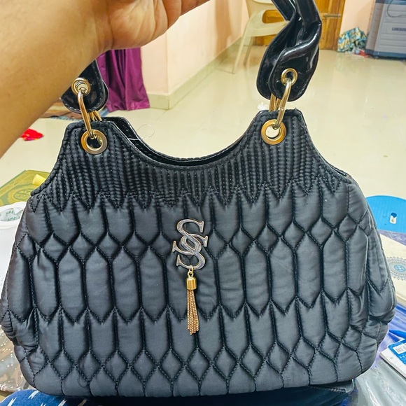 Handbags - New black handbag purchased in Dubai